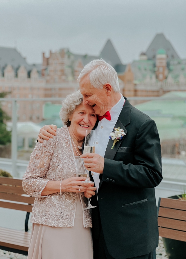 Older Couple Takes Picture at Waterfront